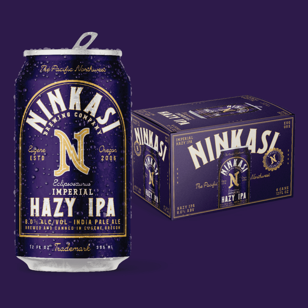 A glistening purple Ninkasi beer can labeled 'Eclipsosaurus Imperial Hazy IPA' with details of its 8.0% alcohol volume, alongside a matching six-pack box set against a deep purple background.